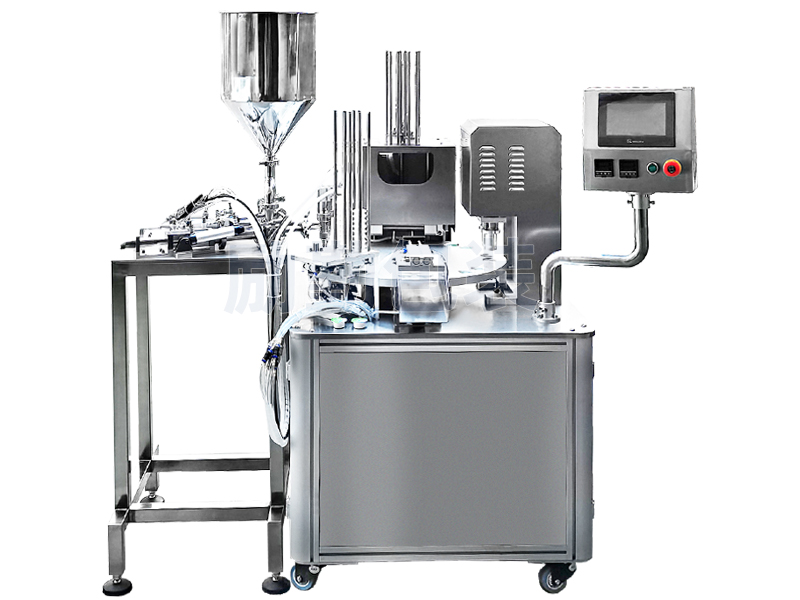 Cup filling and sealing machine